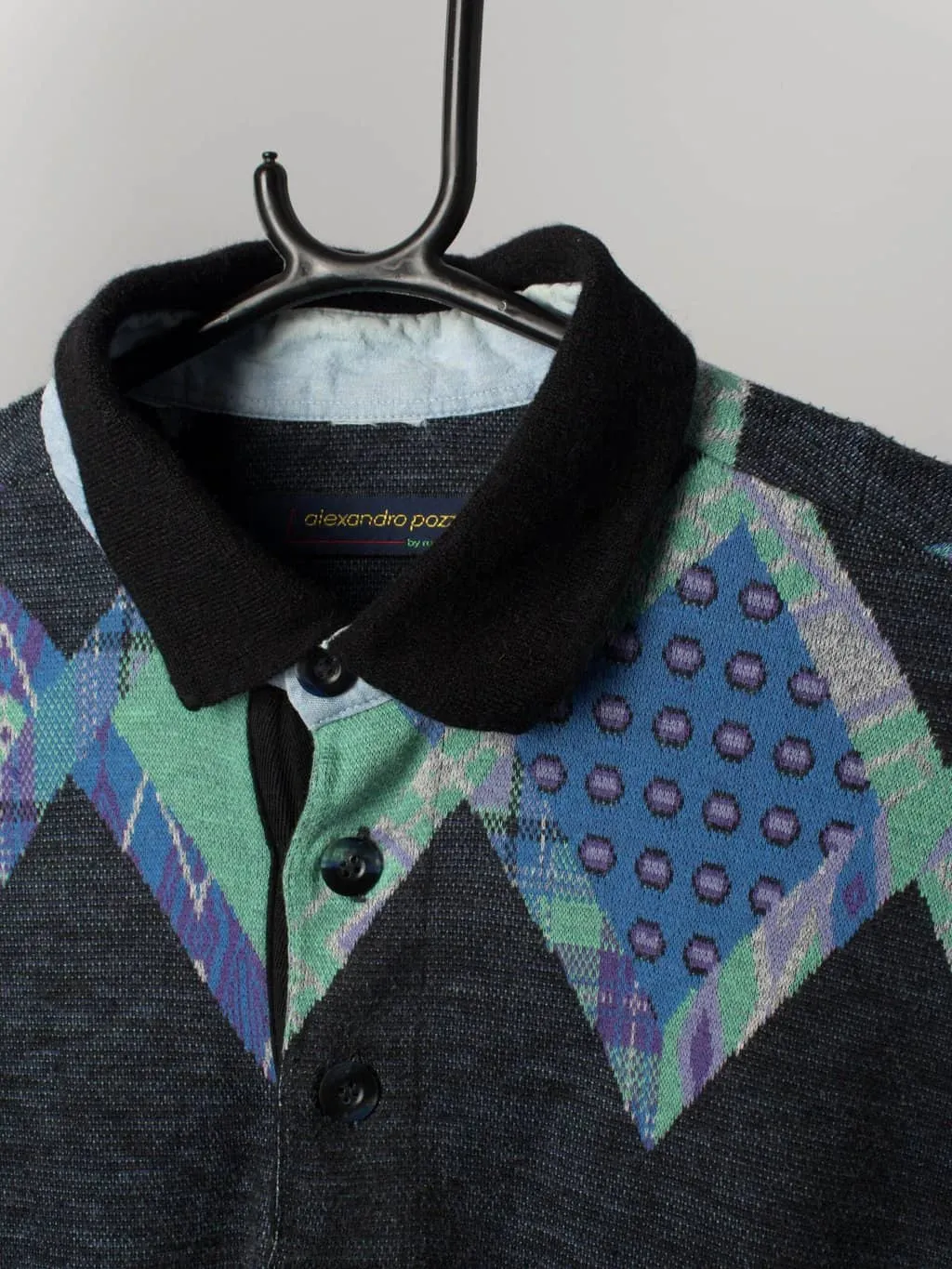 Mens 90s vintage polo shirt style jumper in black with purple and green diamond pattern – Small / Medium